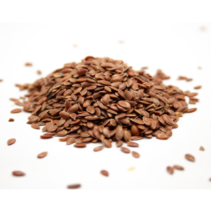 Small brown seeds used as a spice and herbal remedy, with a close-up view showcasing their texture and color.