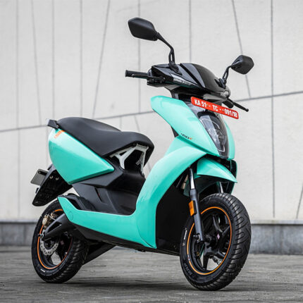 The scooter has a sleek and futuristic design with clean lines and minimalist aesthetics. It features a powerful electric motor, a large touchscreen display, and smart connected features. The scooter also has premium features such as LED lighting, regenerative braking, and a spacious storage compartment. The Ather electric scooter represents eco-friendly transportation with cutting-edge technology and modern styling.