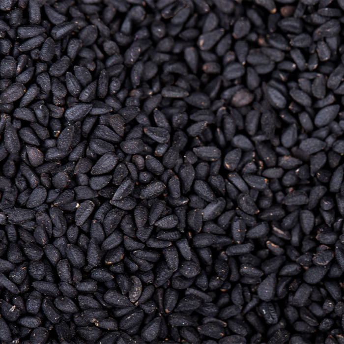 They Are Dry And Uncooked, With A Slightly Curved Shape And A Characteristic Split On One Side. The Image Showcases The Distinct Appearance Of Black Matpe Beans, A Type Of Lentil Commonly Used In Indian, Pakistani, And Other South Asian Cuisines.