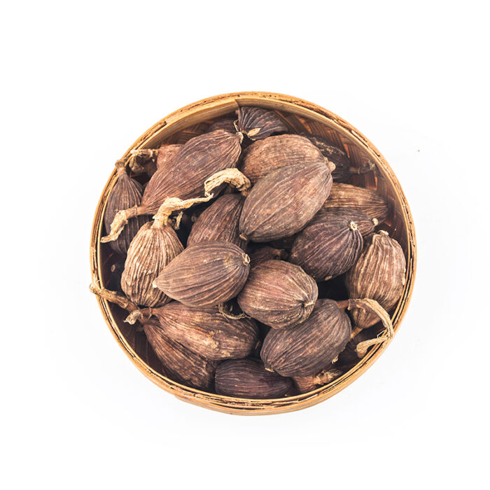 Large Black/Brown Cardamom Pods In A Bowl, Commonly Used As A Smoky And Earthy Spice In South Asian Cuisine, Known For Their Bold And Intense Flavor.