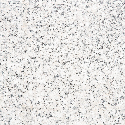 a beautiful natural stone with a white background and subtle gray veining, featuring intricate patterns and speckles, adding texture and depth to any space.