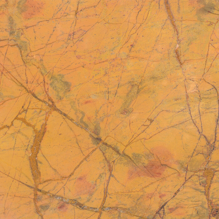 A Vibrant And Eye-Catching Natural Stone With A Yellow Background And Swirling Patterns Of Black And Gray, Adding Energy And Brightness To Any Room.