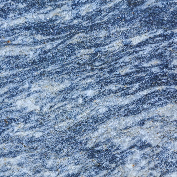 A Breathtaking Natural Stone With A Deep Blue Background And Swirling Patterns Of White And Gray, Reminiscent Of A Mountainous Landscape.