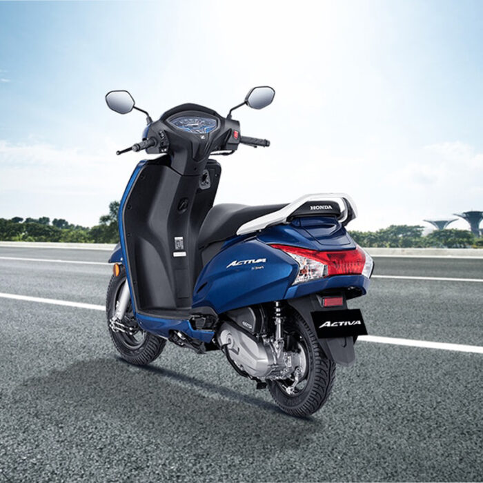 The Scooter Has A Sleek Design With A Streamlined Body, A Comfortable Seat, And Large Wheels For Smooth Maneuverability. The Activa Is Known For Its Reliable Performance, Fuel Efficiency, And Convenience, Making It A Popular Choice For Urban Commuters And City Dwellers.&Quot;