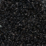a sophisticated and timeless natural stone with a deep black background and speckles of white and silver, adding a touch of sparkle and elegance to any space.