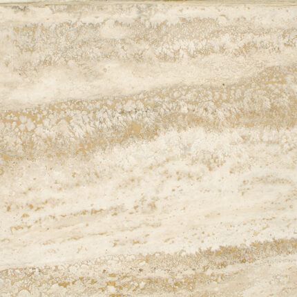 A close-up view of the natural stone surface, featuring a mix of creamy ivory and chocolate brown colors with intricate patterns and veins throughout.