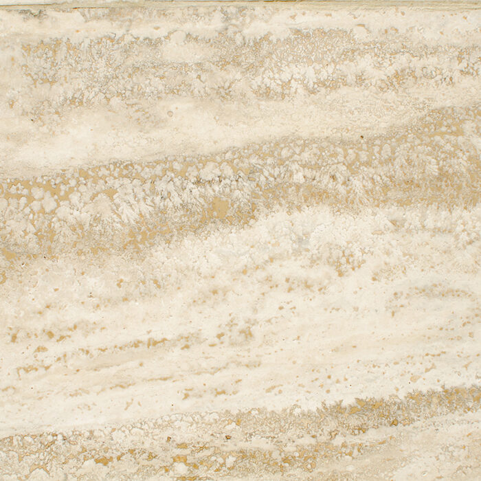 A Close-Up View Of The Natural Stone Surface, Featuring A Mix Of Creamy Ivory And Chocolate Brown Colors With Intricate Patterns And Veins Throughout.