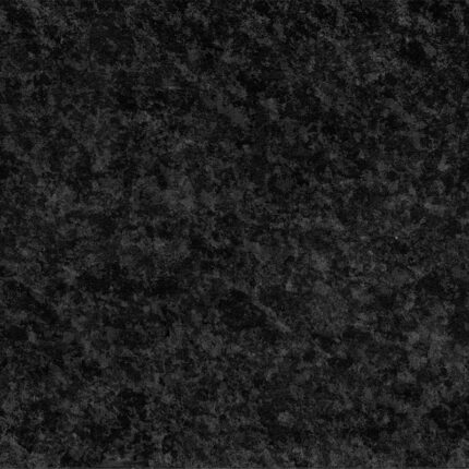 A close-up photograph of the natural stone surface, featuring a consistent dark black color with a subtle, reflective sheen and a fine-grained texture.