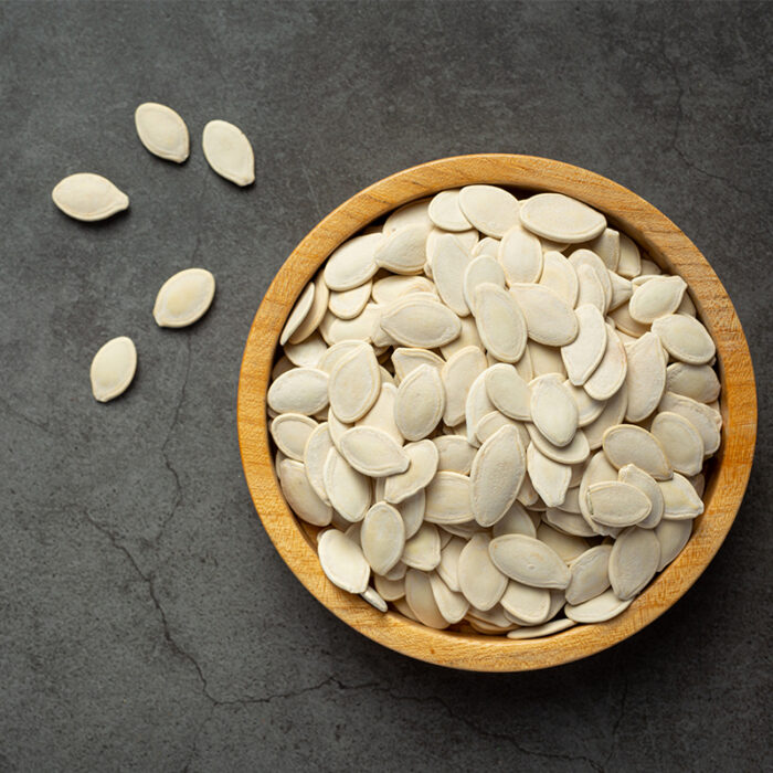 L, Oval Shape And Pale Beige Color. The Seeds Appear To Be Dry And Hard With A Smooth Surface, Commonly Used As A Snack Or Ingredient In Various Culinary Recipes.