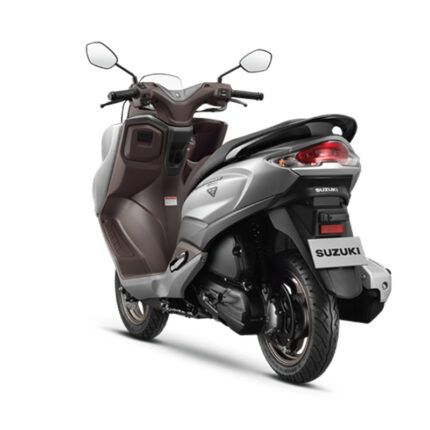 The scooter features a modern and sporty design with a sharp front fascia, a tall windscreen, and stylish body lines. It has large wheels for stability, ample storage space under the seat, and a powerful engine for smooth acceleration. The Burgman Street is known for its luxury scooter features, including an LED headlight, digital instrument cluster, and a comfortable riding experience, making it a popular choice for urban commuting and long rides.