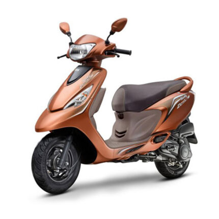 The scooter has a compact and stylish design with sharp lines, a dual-tone body, and vibrant graphics. It features a comfortable seat with a high backrest, telescopic front suspension for a smooth ride, and alloy wheels for stability. The Zest is known for its peppy performance, easy handling, and convenient features, including a large storage space under the seat, a mobile charging socket, and a digital instrument cluster, making it a popular choice for urban commuting and short trips.