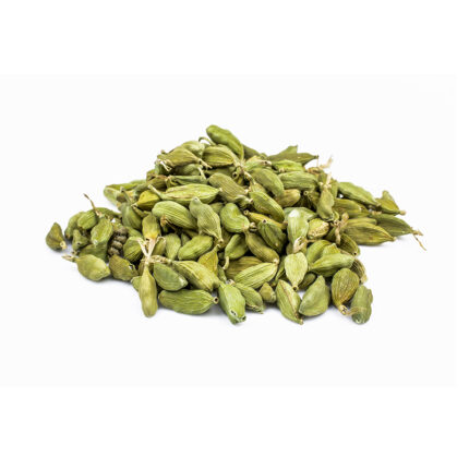 Cardamom seeds in a small dish, commonly used as a fragrant and flavorful spice in baking and cooking, known for their distinct sweet and floral taste.