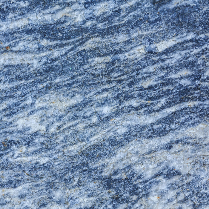 New Himalayan Blue Granite Slab With A Predominantly Blue Background And Grey And Beige Mineral Deposits Throughout. The Surface Has A Polished Finish And Is Suitable For Use In Countertops, Flooring, And Wall Cladding