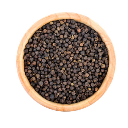 Black peppercorns in a bowl, commonly used as a spice in cooking and seasoning, known for their pungent and slightly spicy flavor.