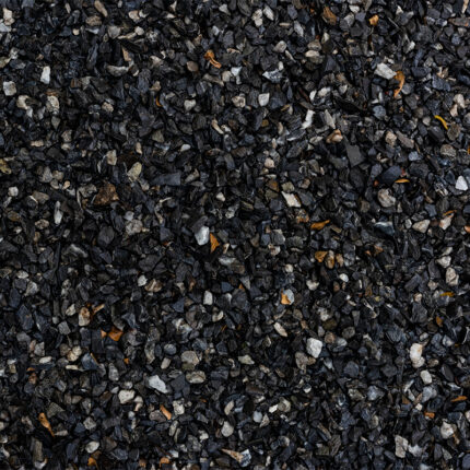 a smooth, dark black granite with a polished finish and subtle, natural patterns resembling the flow of a river.