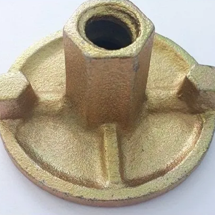 The Nut Has A Round Shape And Is Made Of Metal With A Silver Or Gray Finish. It Has Threads On The Interior To Match Those Of The Rod Or Bolt And Is Designed To Be Embedded In Concrete Or Masonry To Create A Secure Connection.