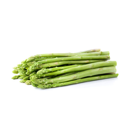 "Close-up of a bundle of green asparagus spears on a white plate. The asparagus spears are long and thin with a vibrant green color and a slightly curved shape. They are topped with small, tightly closed buds at the tip. The image captures the appearance of asparagus, a vegetable known for its tender texture and delicate, earthy flavor.