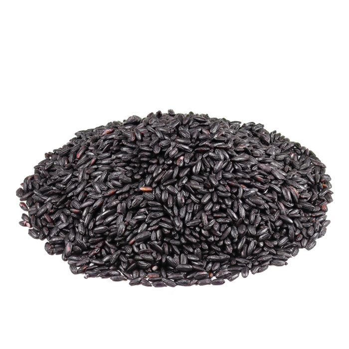 The Grains Of Black Rice Are Small And Glossy, With Shades Ranging From Dark Purple To Black. The Image May Show A Bowl Of Cooked Black Rice Or A Pile Of Uncooked Rice Grains. Black Rice Is Also Referred To As Forbidden Rice And Is Often Associated With Its Historical Significance And Exclusivity In Ancient China.