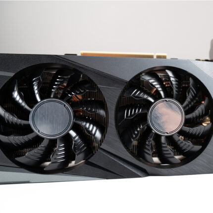 The CPU cooler may consist of a metal heatsink with fins and heat pipes, along with a fan or fans for active cooling.