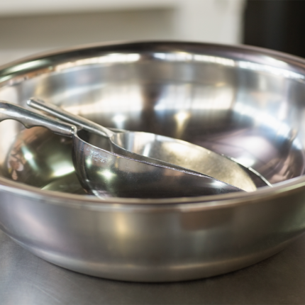 This mixing bowl features a rounded shape with a slightly flared rim, allowing for easy mixing and tossing of ingredients. The steel construction ensures durability and resistance to stains and odors.