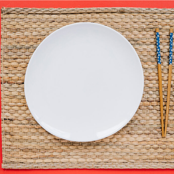 This Plate Features An Embossed Pattern On Its Surface, Adding A Touch Of Texture And Visual Interest. The Raised Edges Help Contain The Rice And Prevent It From Spilling Over.