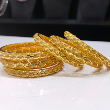 . They may be plain, engraved, textured, or adorned with gemstones or intricate patterns. Gold bangles are a popular accessory in many cultures and are often worn for special occasions, festivals, or as everyday jewelry.