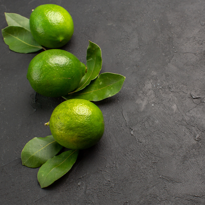 Kaffir Lime Leaves On A White Background. Kaffir Lime Leaves Are A Fragrant, Flavorful Leaf That Is Commonly Used In Thai, Cambodian, And Indonesian Cuisine. They Are Dark Green, Glossy, And Have A Unique, Citrusy Aroma. Kaffir Lime Leaves Are Used In Soups, Curries, And Stir-Fries To Add Flavor And Aroma. They Are Also Used In Traditional Medicine For Their Various Health Benefits, Including Reducing Inflammation And Promoting Digestion.