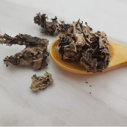 Kalpasi is a dried and black-colored lichen that resembles a small rock or stone. It is primarily used as a spice in Indian cuisine, particularly in the preparation of biryani and other flavorful dishes.