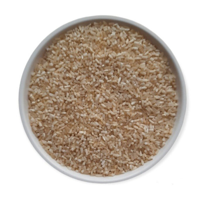 The Grains Of Mogra Rice Are Slender And Long, With A White Color. The Image May Show A Bowl Of Cooked Mogra Rice Or A Pile Of Uncooked Rice Grains. Mogra Rice Is Known For Its Exquisite Fragrance, Often Compared To The Aroma Of Jasmine Flowers.