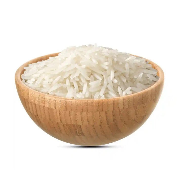 The Image May Show A Bowl Of Cooked Parmal Rice Or A Pile Of Uncooked Rice Grains. Parmal Rice Is Known For Its Versatility And Adaptability In Various Culinary Preparations.