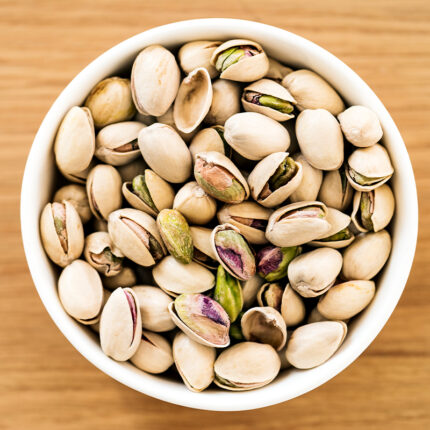 Pistachios are a type of tree nut commonly used in culinary applications, particularly in Mediterranean and Middle Eastern cuisines. They can be consumed raw or roasted and salted as a snack, or used as an ingredient in various dishes, such as salads, desserts, and sauces. Pistachios are also known for their potential health benefits, such as being a good source of protein, fiber, and healthy fats, and helping to reduce the risk of heart disease.