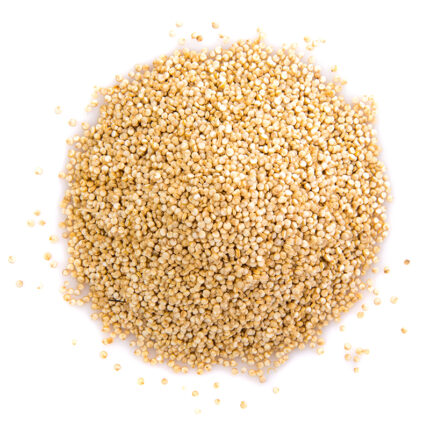 The quinoa seeds are small and round with a flat shape and a light beige color. They have a slightly glossy surface and are arranged in a pile. The image captures the appearance of quinoa seeds, a popular gluten-free grain known for their nutty flavor and versatile use in various dishes. The alt text conveys the small, round, flat shape, light beige color, and glossy surface of quinoa seeds. Quinoa seeds can be cooked and used as a base for salads, stir-fries, and bowls, or used as a side dish to complement various protein sources.