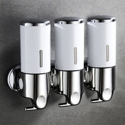The dispenser is typically made of plastic or metal and has a pump mechanism or push-button for dispensing the soap. It is installed at a convenient height on the shower wall, within easy reach.