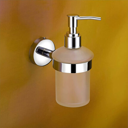 The dispenser is typically made of plastic or metal and has a pump mechanism or push-button for dispensing the soap. It may have a clear or opaque reservoir to monitor the soap level.