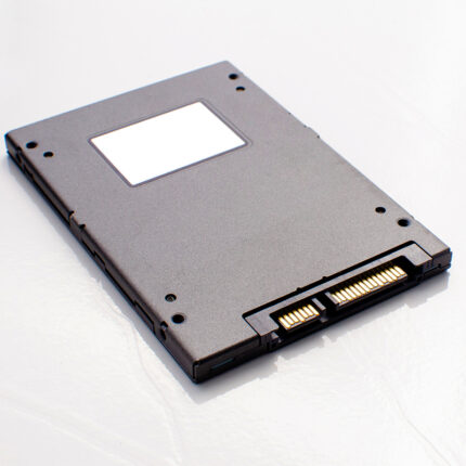 . The SSD image may show the rectangular or square-shaped device with a solid-state circuitry inside. It may include branding or labels indicating the manufacturer, model, or storage capacity.