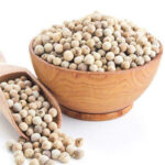 white peppercorns, a spice derived from the dried berries of the Piper nigrum plant, which are then husked to remove the outer layer, resulting in a white-colored peppercorn with a slightly milder taste than black pepper. White pepper is commonly used in cooking to add flavor and seasoning to dishes such as sauces, marinades, and soups.