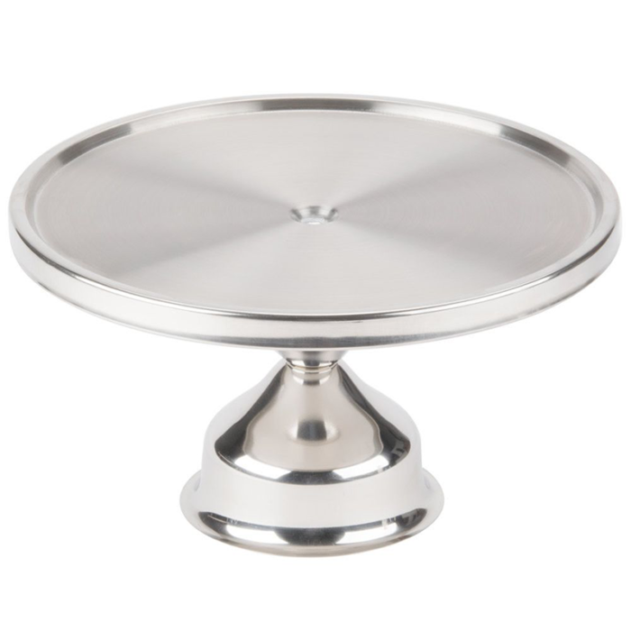 The Cake Stand Is Typically Made Of Materials Such As Glass, Porcelain, Or Metal, And Features A Flat Or Slightly Elevated Surface On Which The Cake Is Placed.