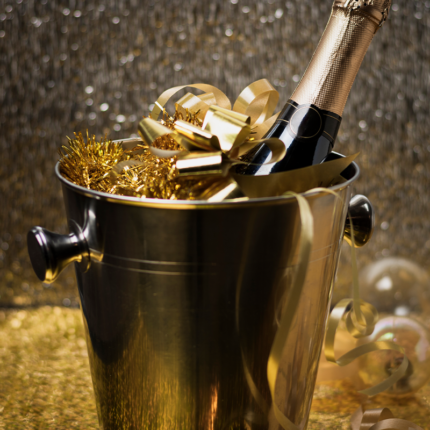 A champagne bucket, also known as an ice bucket, is a specially designed container used for chilling and serving champagne or sparkling wine.