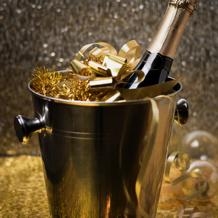 A Champagne Bucket, Also Known As An Ice Bucket, Is A Specially Designed Container Used For Chilling And Serving Champagne Or Sparkling Wine.