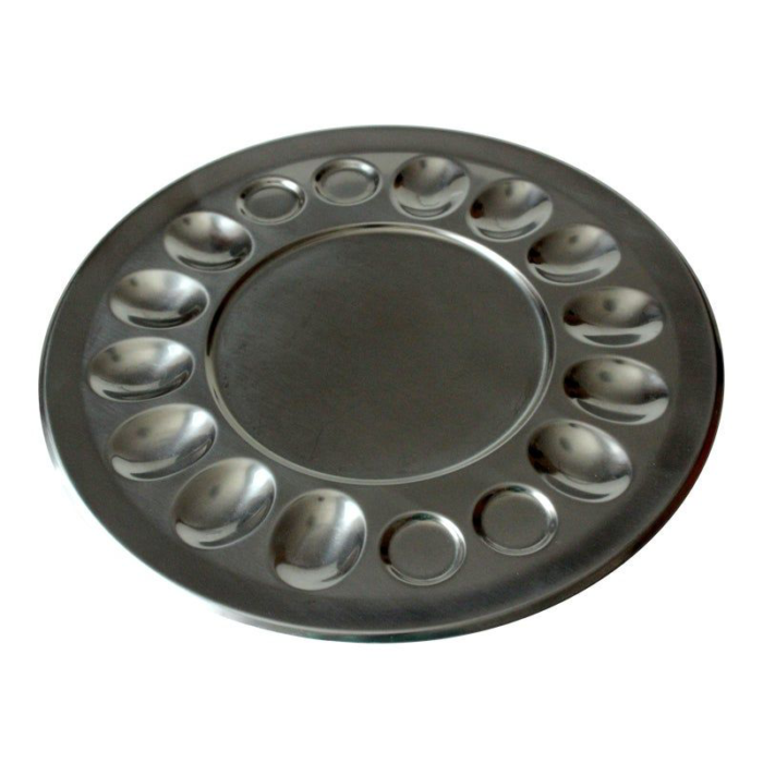 A Dish Specifically Designed For Serving Eggs. An Egg Plate Typically Has Compartments Or Wells To Hold Individual Eggs, Keeping Them Separated And Preventing Them From Rolling Around.