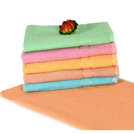 A luxurious Goldy Crape towel made of soft and absorbent fabric. The towel has a golden-yellow color with a crinkled or crepe-like texture, adding a unique and stylish touch to your bathroom or beach accessories.