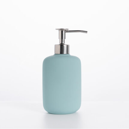 A sleek and modern soap dispenser made of durable materials. The dispenser has a cylindrical shape with a pump mechanism on top for easy dispensing of liquid soap.