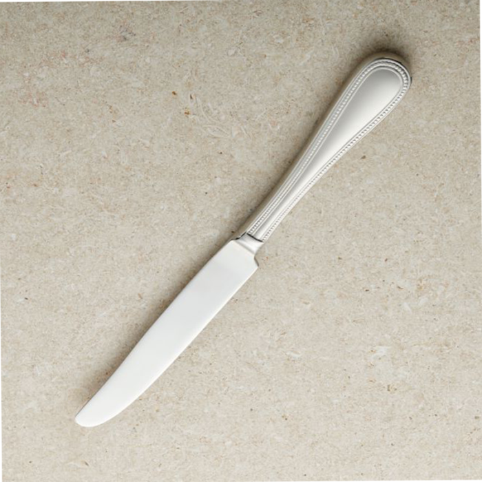 A Table Knife, A Common Utensil Used For Cutting And Spreading Food At The Dining Table. It Has A Sturdy Handle And A Sharp, Serrated Or Non-Serrated Blade, Designed For Slicing Through Various Types Of Food, Such As Meat, Vegetables, And Bread.