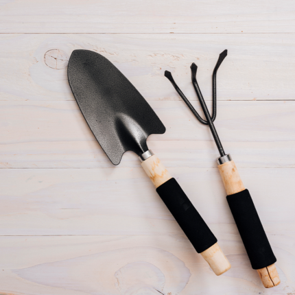 Weeding Trowel with PVC Grip, a handheld gardening tool featuring a trowel-shaped blade and a PVC grip handle, designed for precise and efficient removal of weeds in the garden.