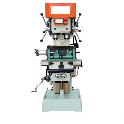 Double spindle drilling and tapping machine for simultaneous drilling and tapping operations.