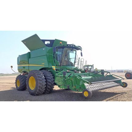 Green Combined Harvester, an agricultural machine designed for efficient crop harvesting. The combine harvester stands out with its vibrant green color.