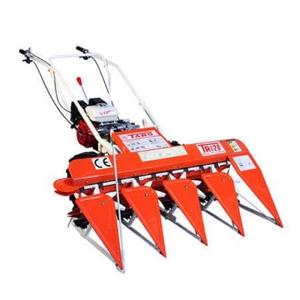 The orange colour reaper binder is a agricultural machine used for harvesting and binding crops such as grains, including wheat, rice, and barley.