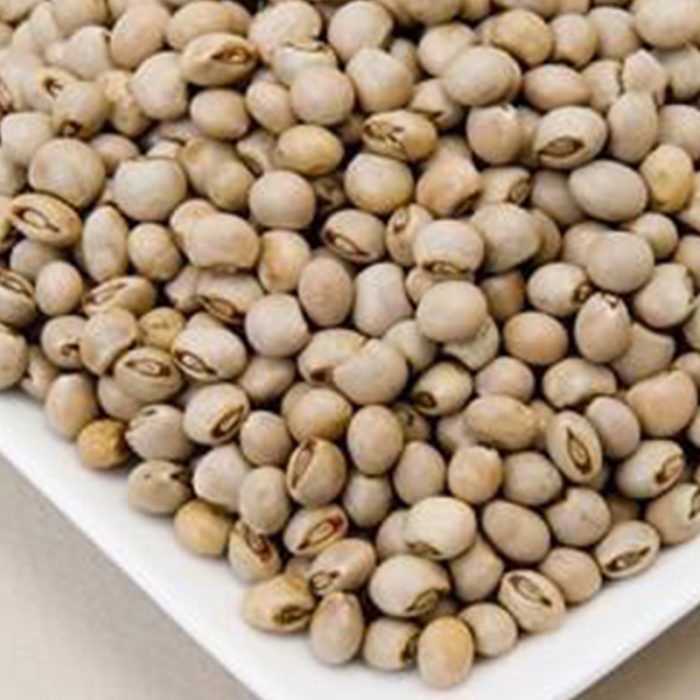 The Seeds Are Medium-Sized, Oval-Shaped, And Have A Light Beige Or Yellowish-Brown Color