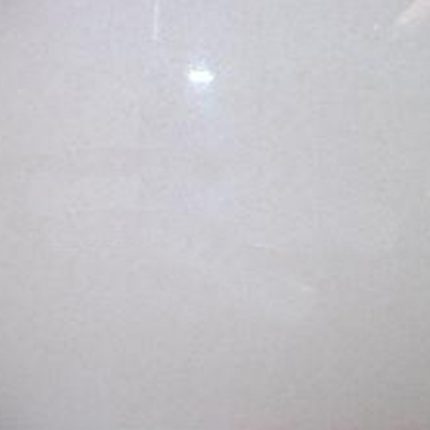 A natural stone with a bright white appearance, originating from Vietnam, suitable for various interior applications.